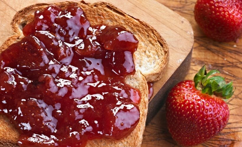 Homemade white bread with strawberry jam.