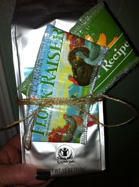 A gift pack of coffee and two DIY coffee sleeves wrapped in twine and tied in a bow.