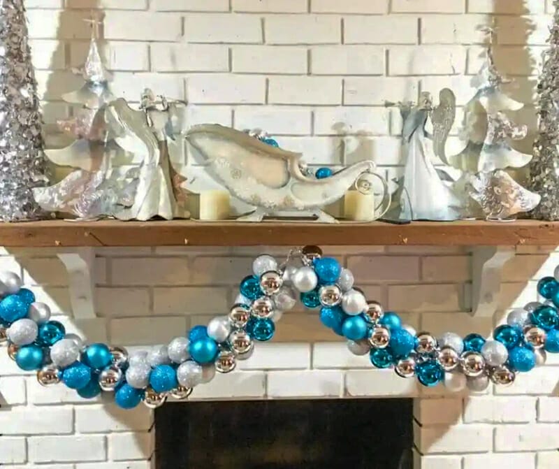 A garland made of blue, white, and silver ornaments.
